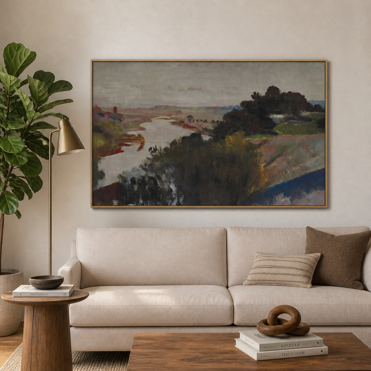 Abstract river landscape wall art with dark trees and muted earth-tone fields displayed above a wooden dining table.