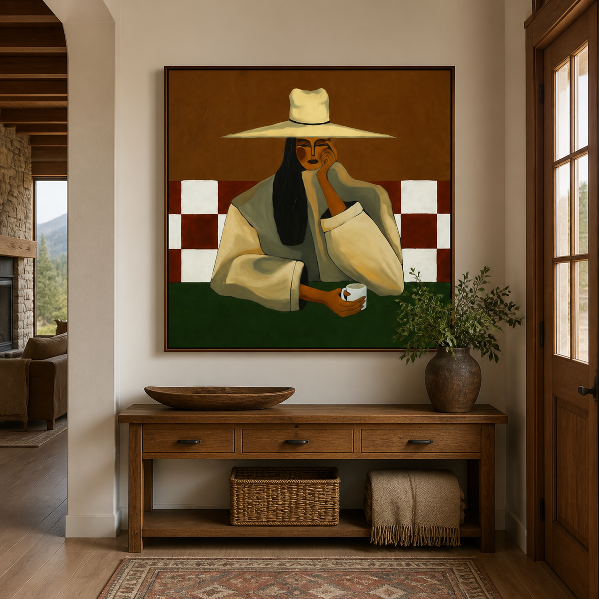 Seated cowboy wall art with a cream hat and coffee cup displayed above a wooden entryway console.