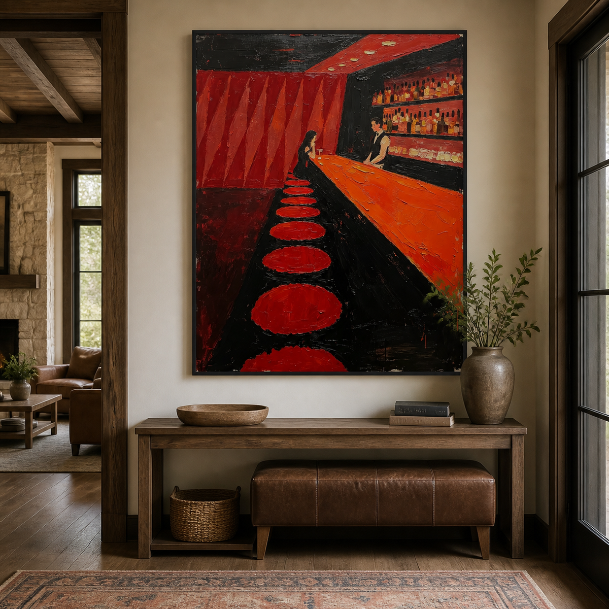 Moody red bar wall art with round stools and a glowing cocktail counter displayed above a leather sofa.