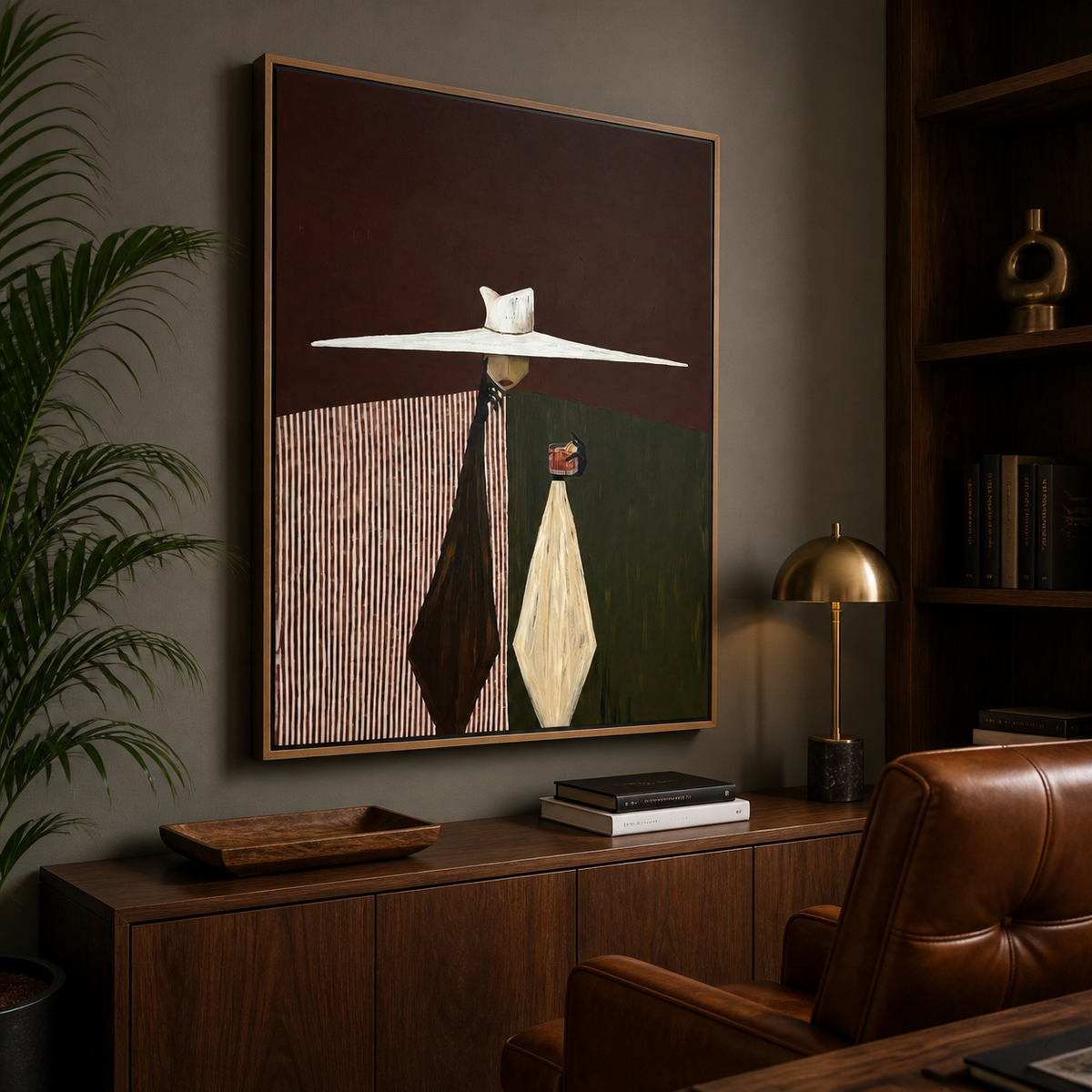 Modern Western couple wall art with two stylized figures beneath a wide white hat displayed above a neutral sofa.