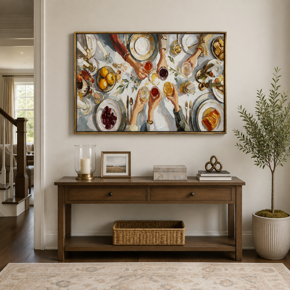 Hands raising glasses above a dinner table with plates, lemons, grapes, bread, and greenery, in an entryway.
