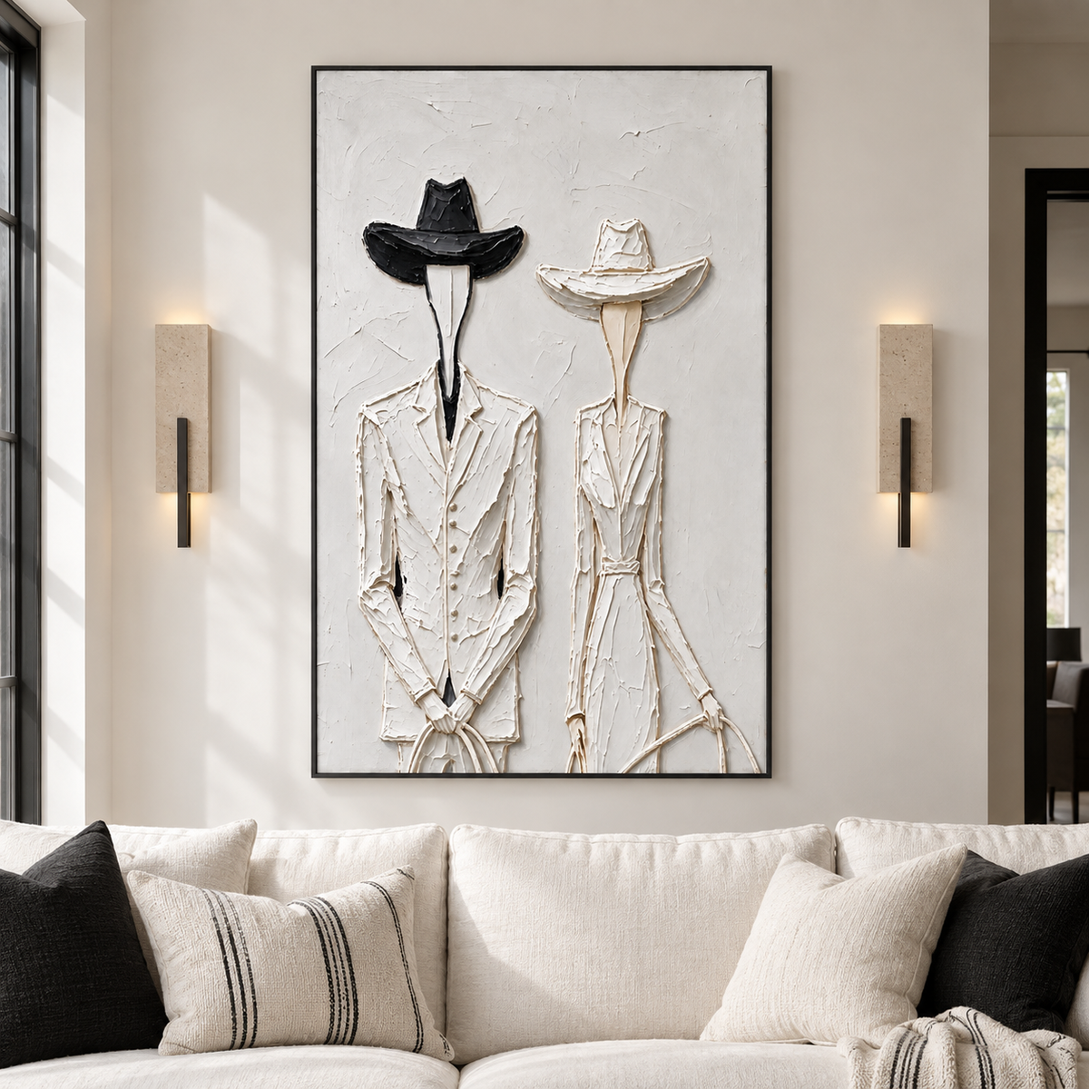 Two slender faceless Western figures in pale clothing, one with a black hat and one with a white hat, shown in a black white living room.