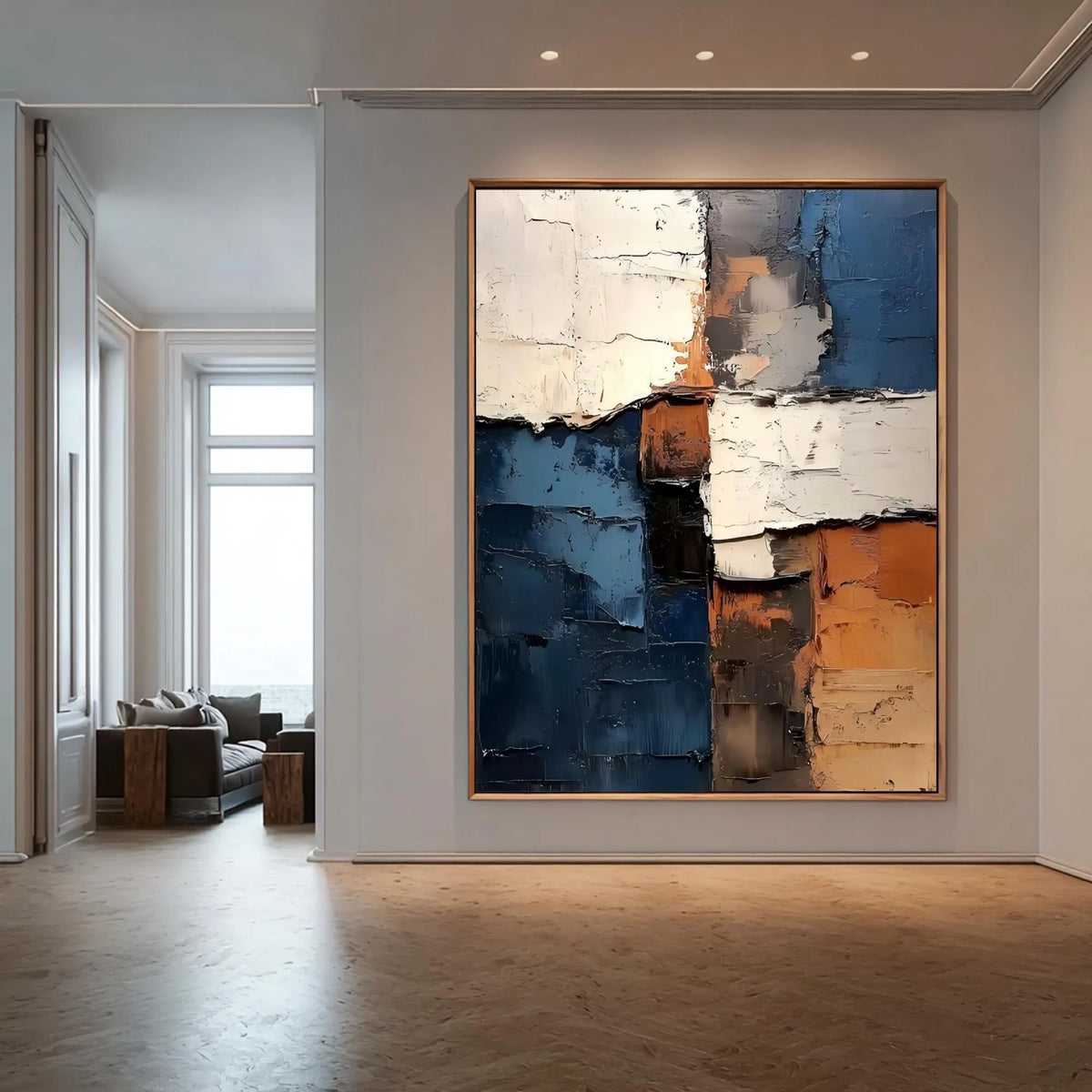 Rough-edged blocks of deep blue, ivory and rust orange in a vertical abstract composition, shown in room setting 3.