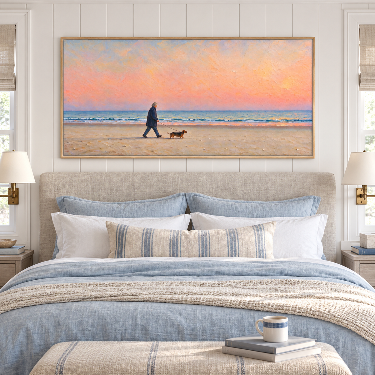 A silver-haired man in a navy coat walking a small brown dog along a sandy beach beneath a broad peach-pink sky with a narrow band of blue ocean waves, shown in room setting 3.