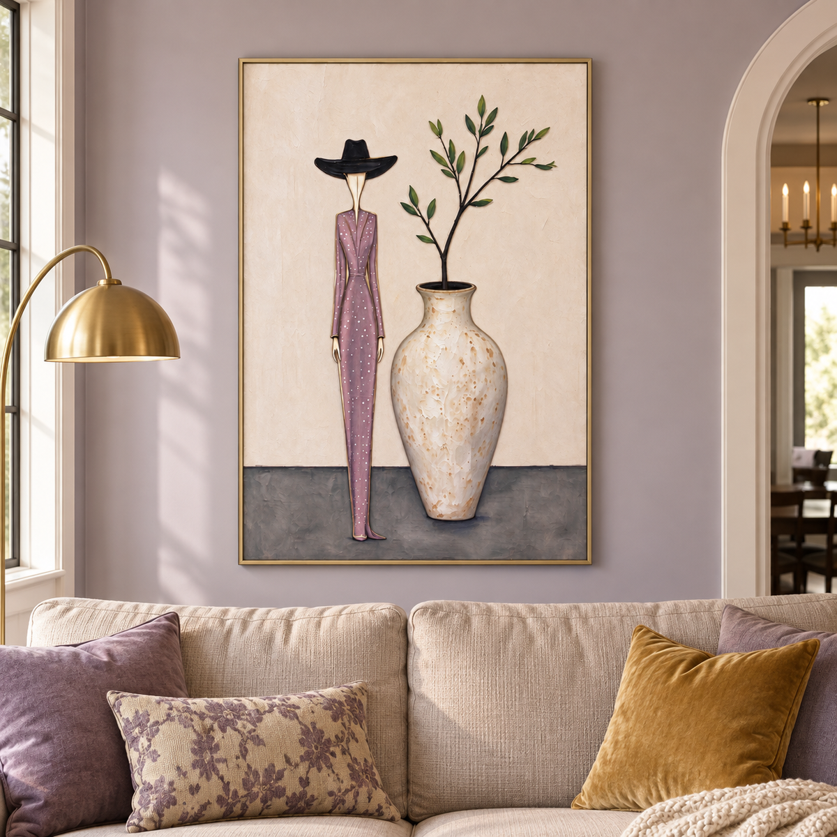 A tall woman in a mauve polka-dot suit and black hat beside a rounded vase with a leafy branch, in a softly colored living room.