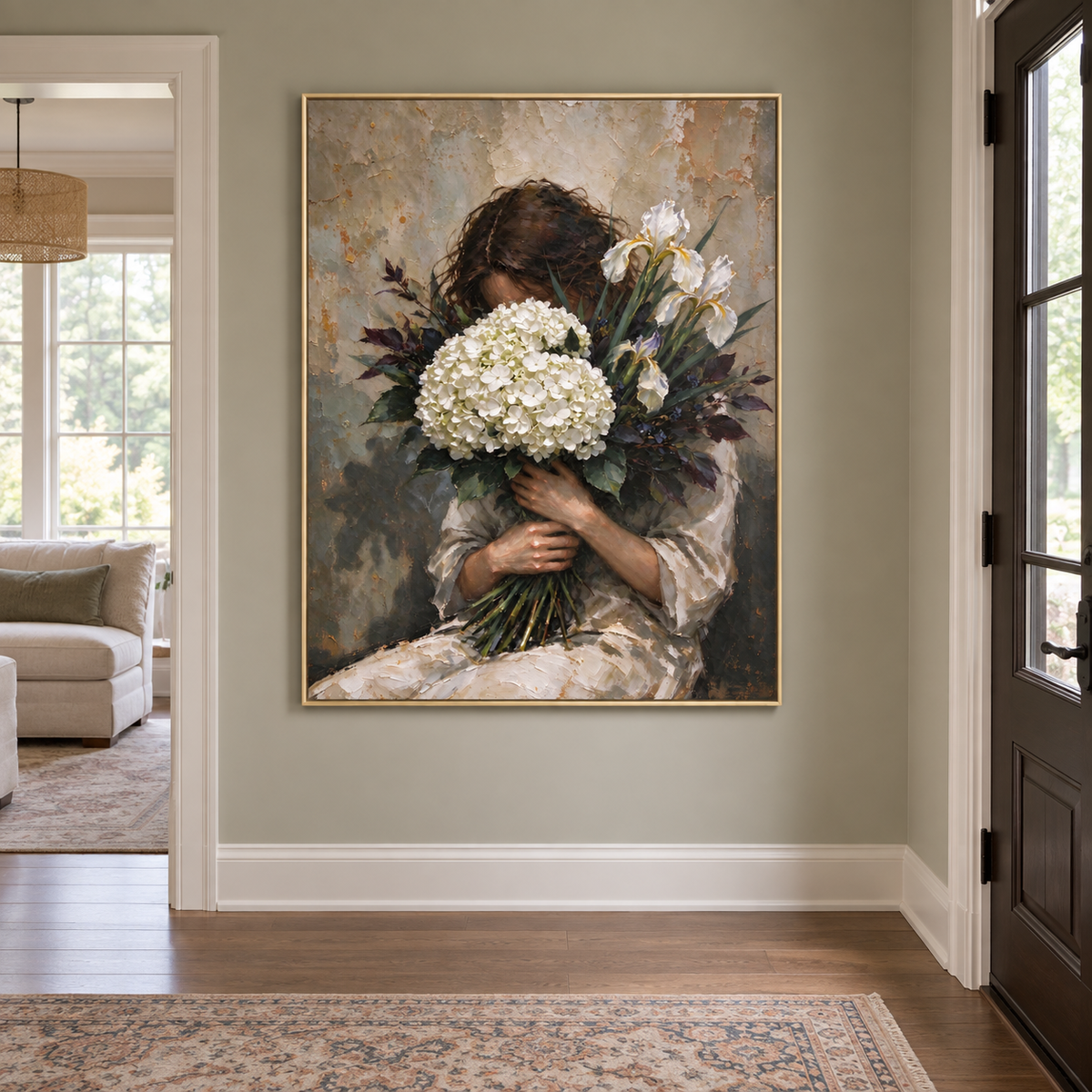 A seated woman embracing white hydrangeas and dark foliage that partly hide her face against a muted gray background, shown in an interior setting.