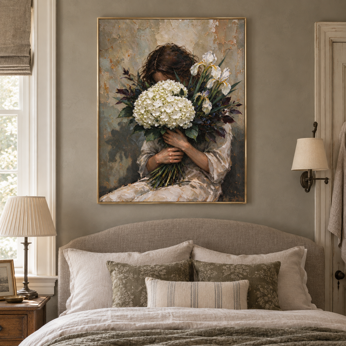 A seated woman embracing white hydrangeas and dark foliage that partly hide her face against a muted gray background, shown in a living room.