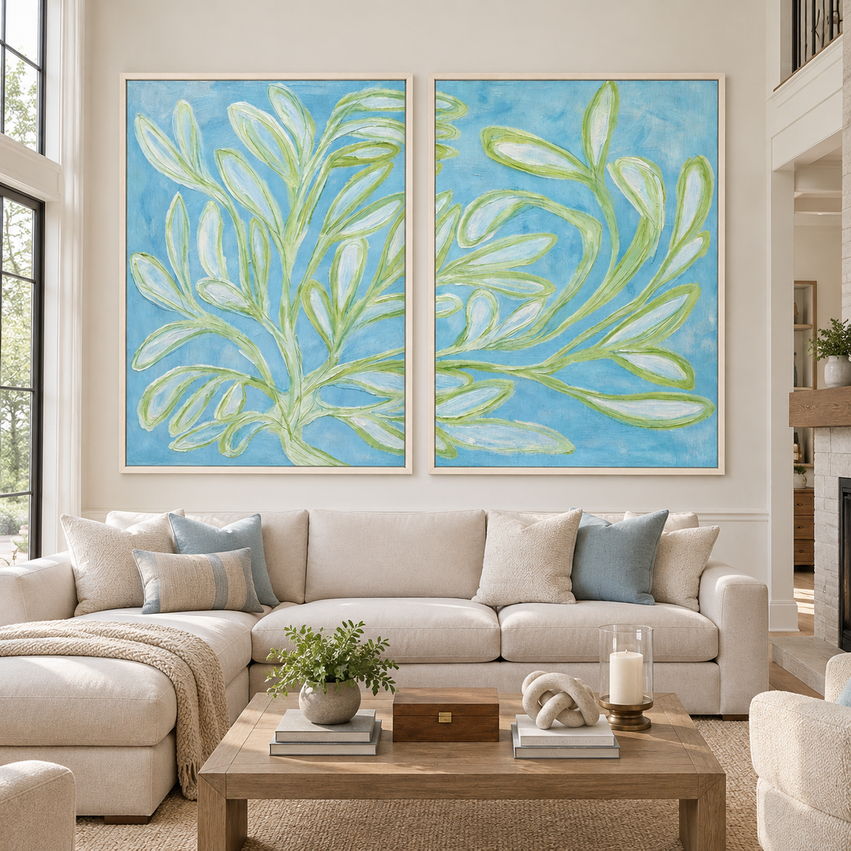 Long green leaves and slender branches across two pale blue panels, in a large living room.