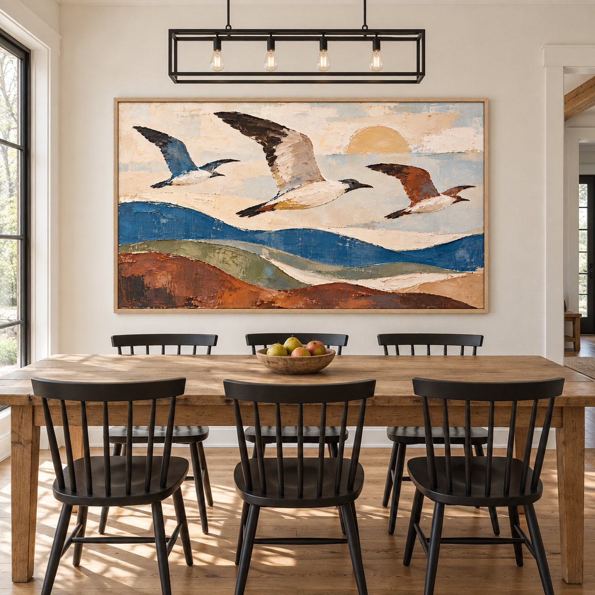 Three birds in flight above rolling blue, sage, and rust-colored hills beneath a pale sun, above a country-style dining room sideboard.