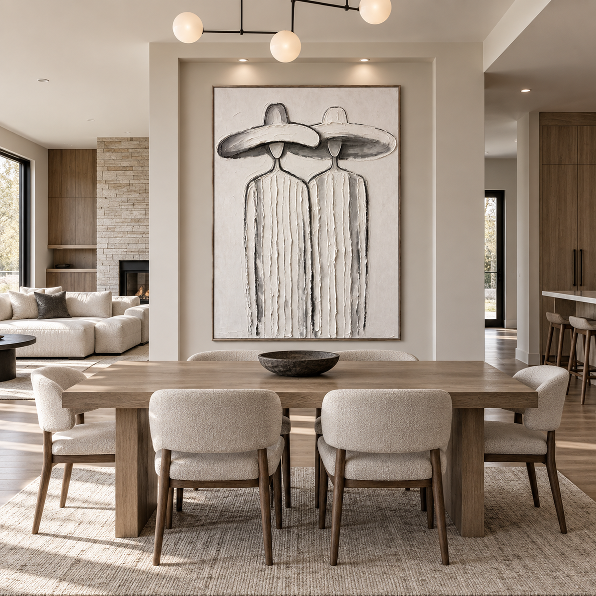 Two slender faceless figures in pale striped clothing and overlapping broad white hats, shown in a scandinavian dining room.