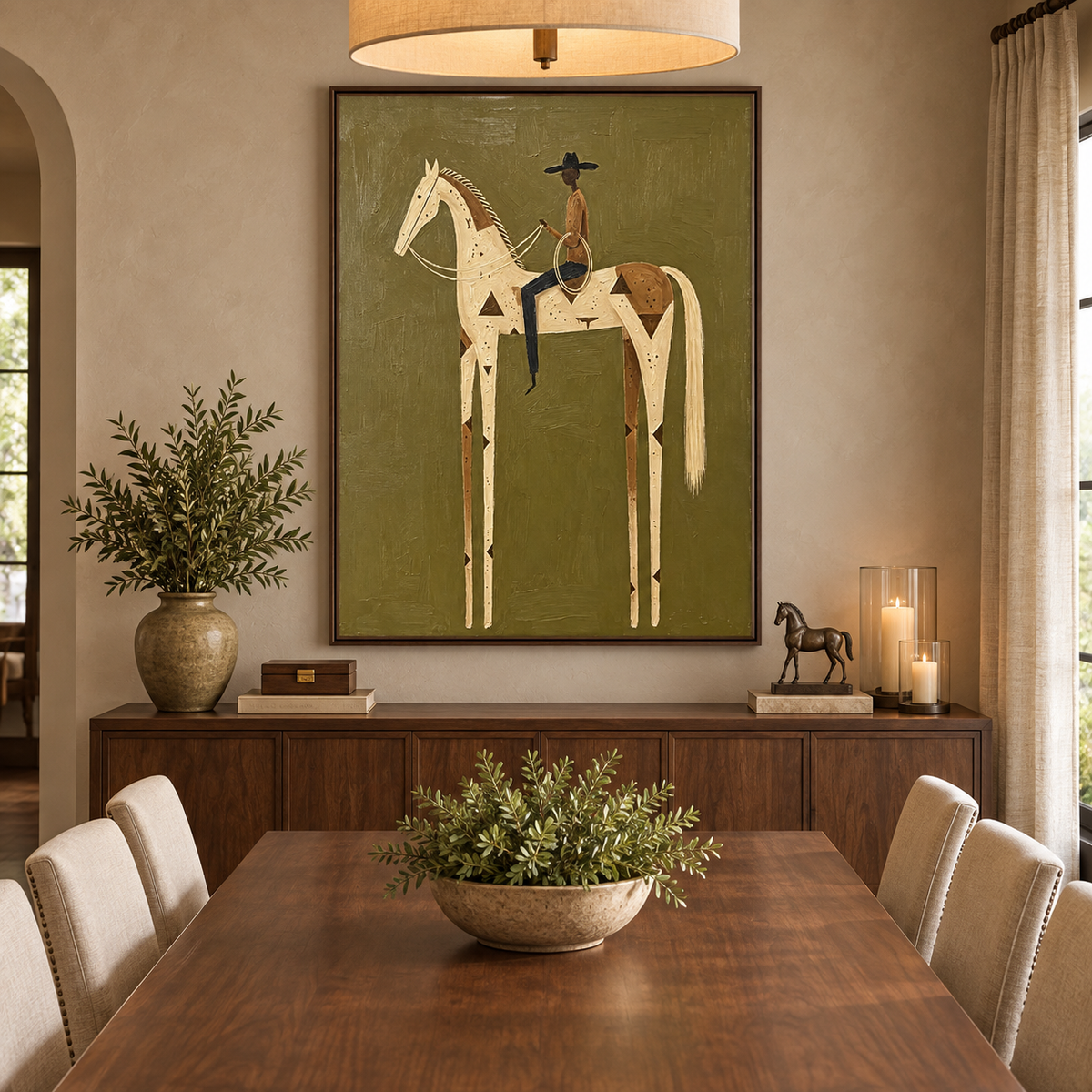 A cowboy holding a lasso on a tall cream and brown spotted horse against olive green, in a dining room.