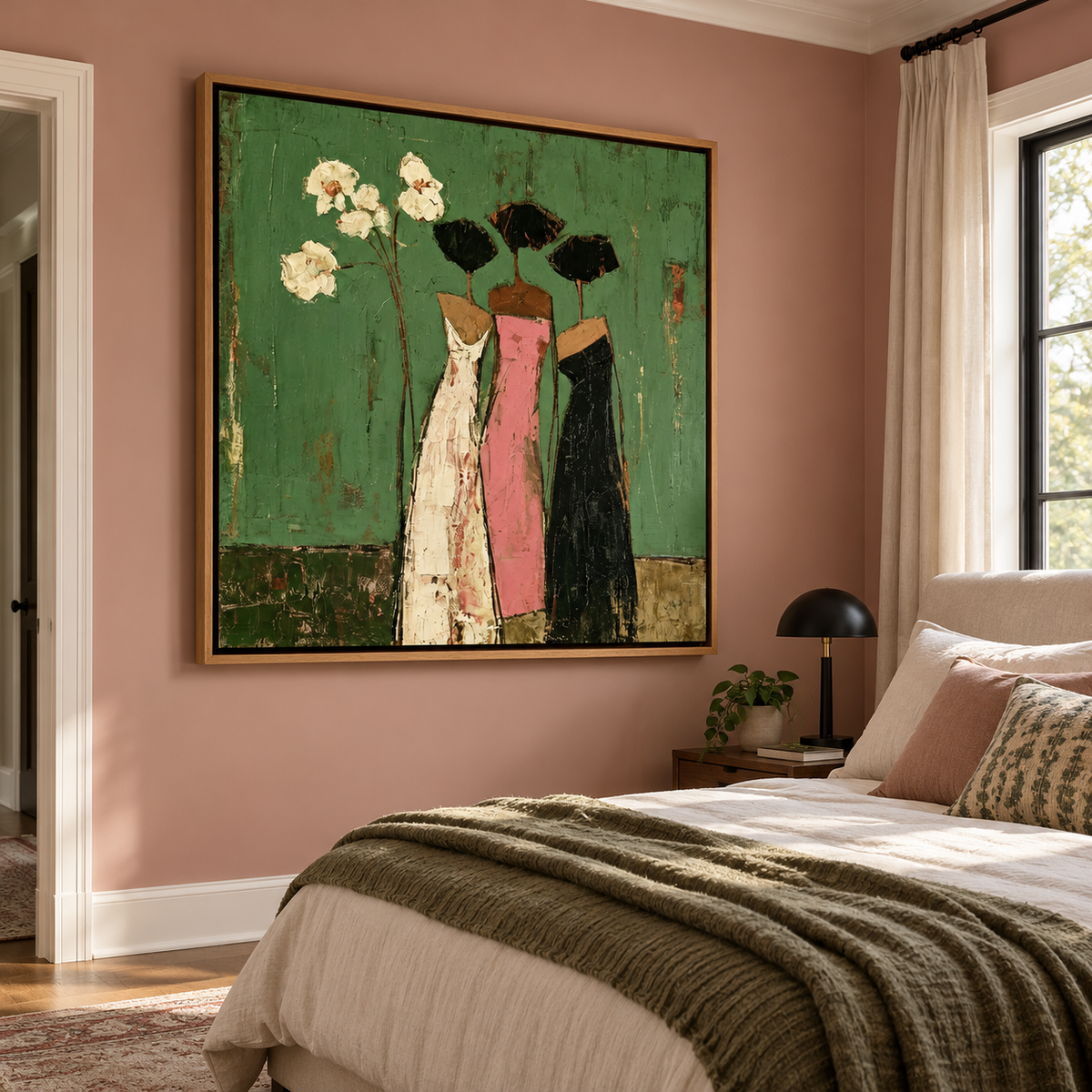 Three slender women in cream, pink and black dresses standing together beside white flowers on a green background, shown in room setting 4.