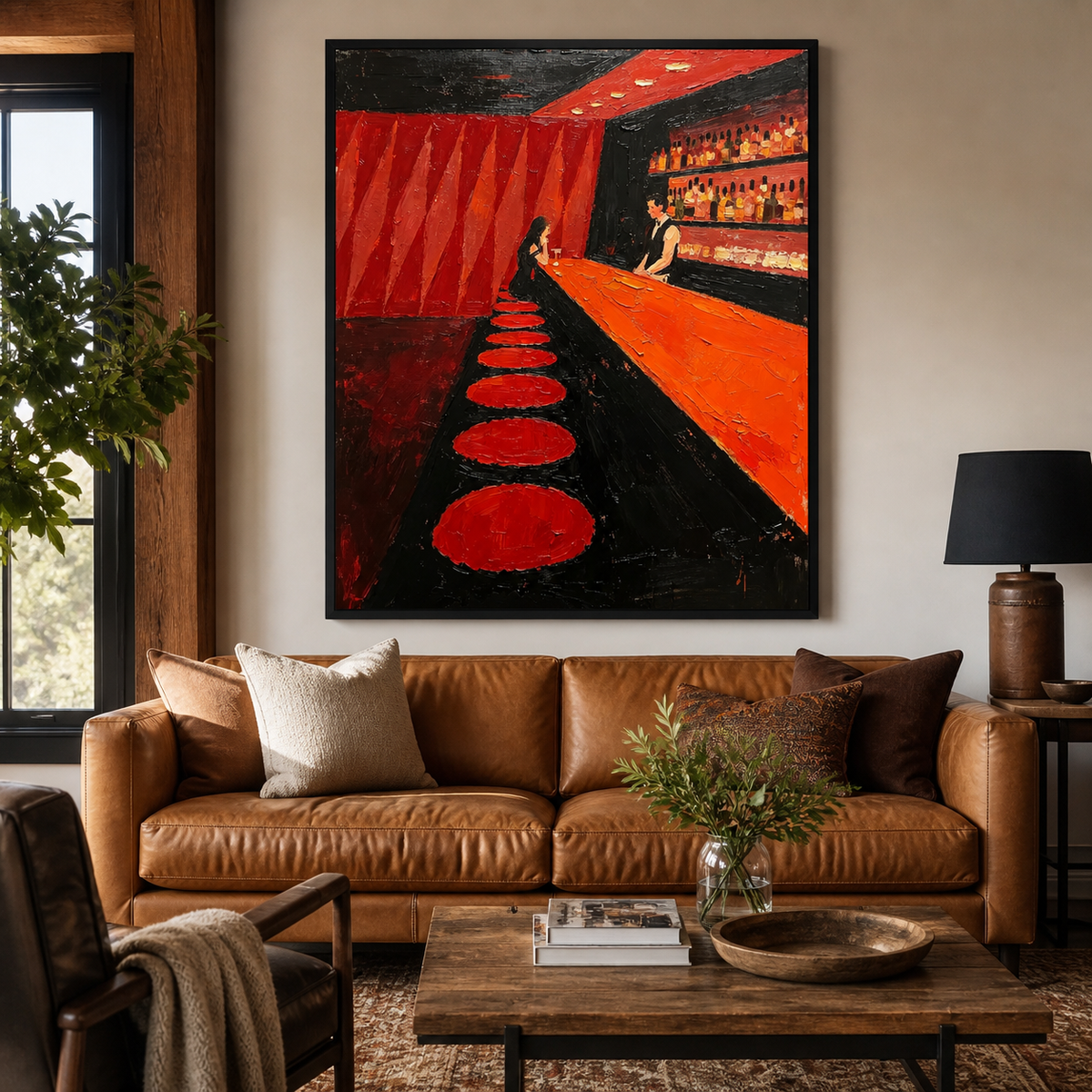 Moody red bar wall art with round stools and a glowing cocktail counter displayed above a leather sofa.