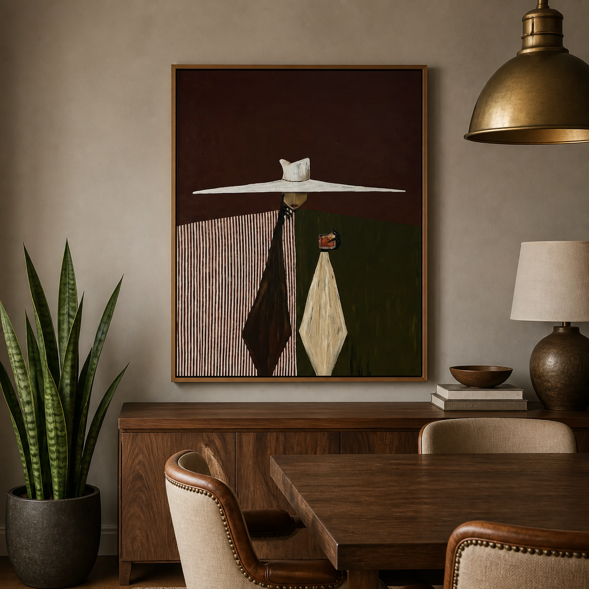 Modern Western couple wall art with two stylized figures beneath a wide white hat displayed above a neutral sofa.