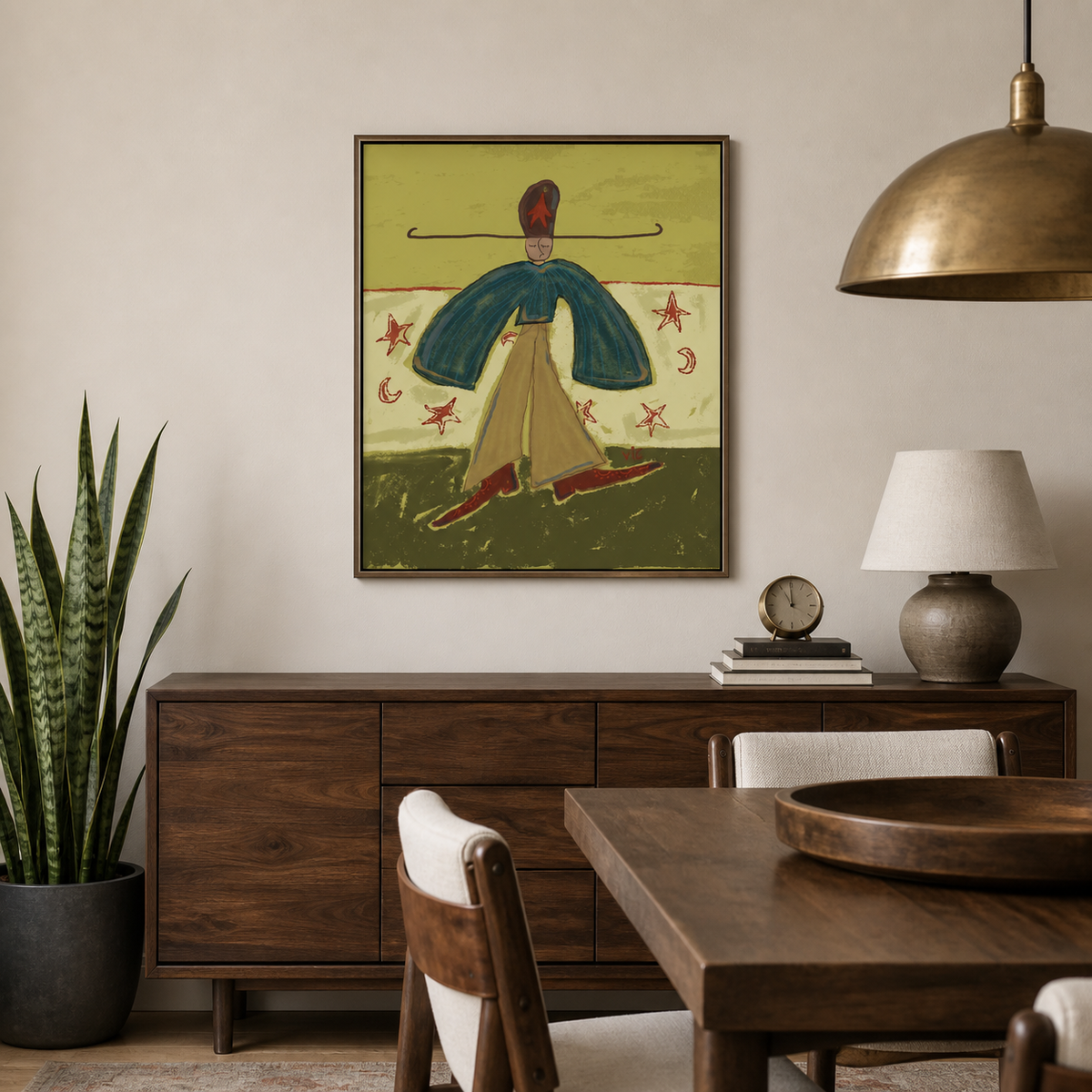 Colorful Western woman wall art with a teal cape, golden skirt and star motifs displayed above a neutral living room sofa.