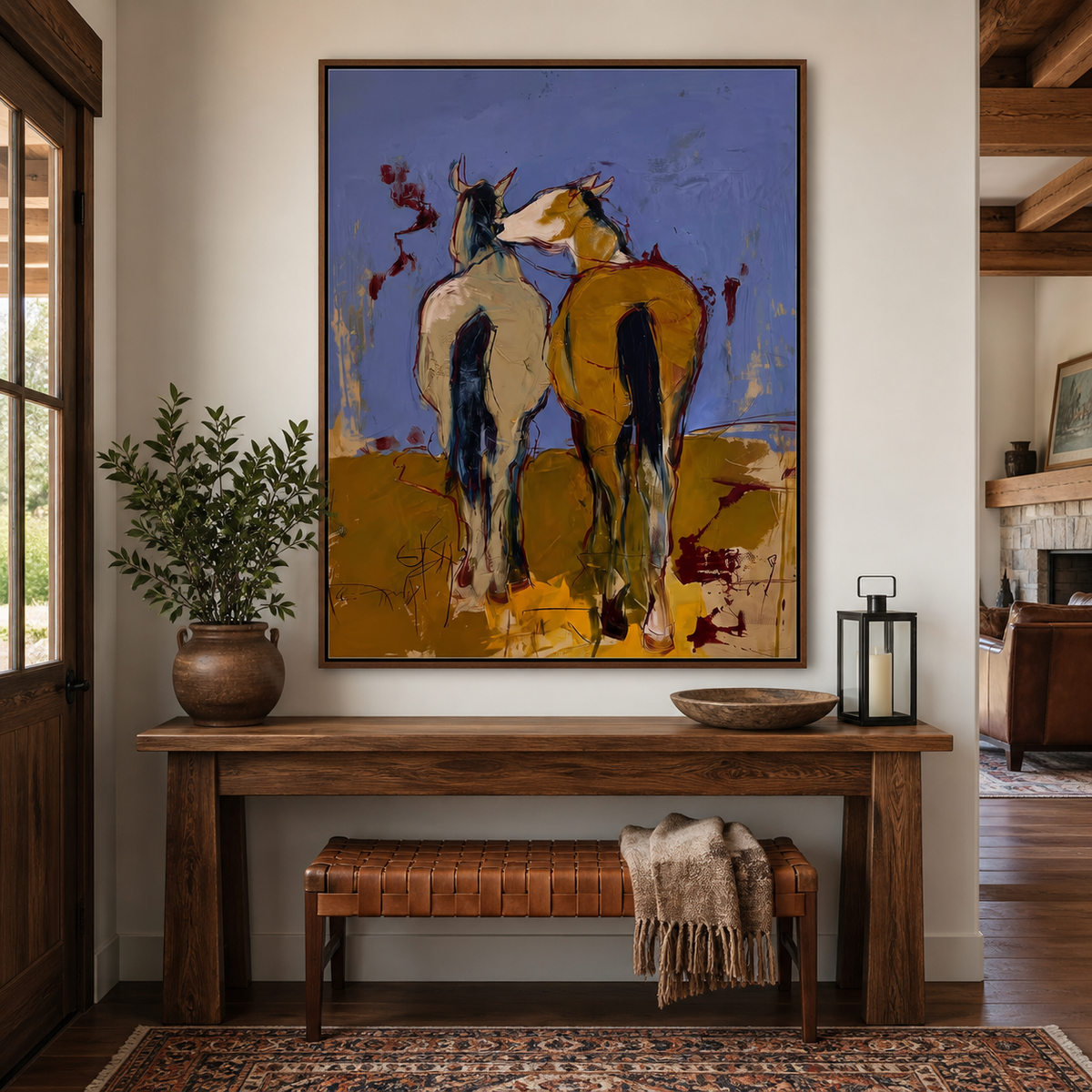 Two horses wall art showing a cream-gray horse and chestnut horse standing together above an entryway console.