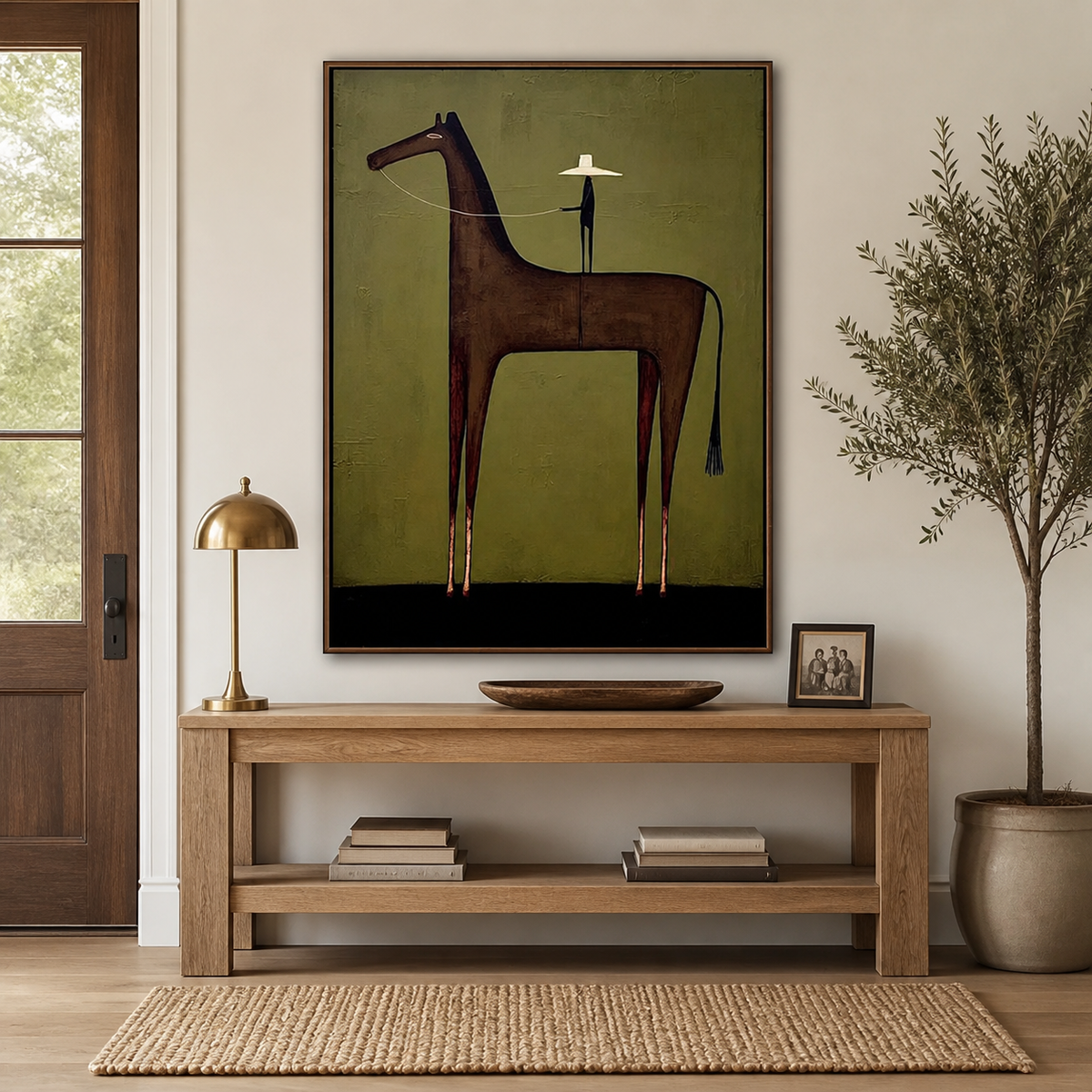 Vertical Western horse wall art with a dark brown horse and cowboy figure against an olive-green background above a sofa.