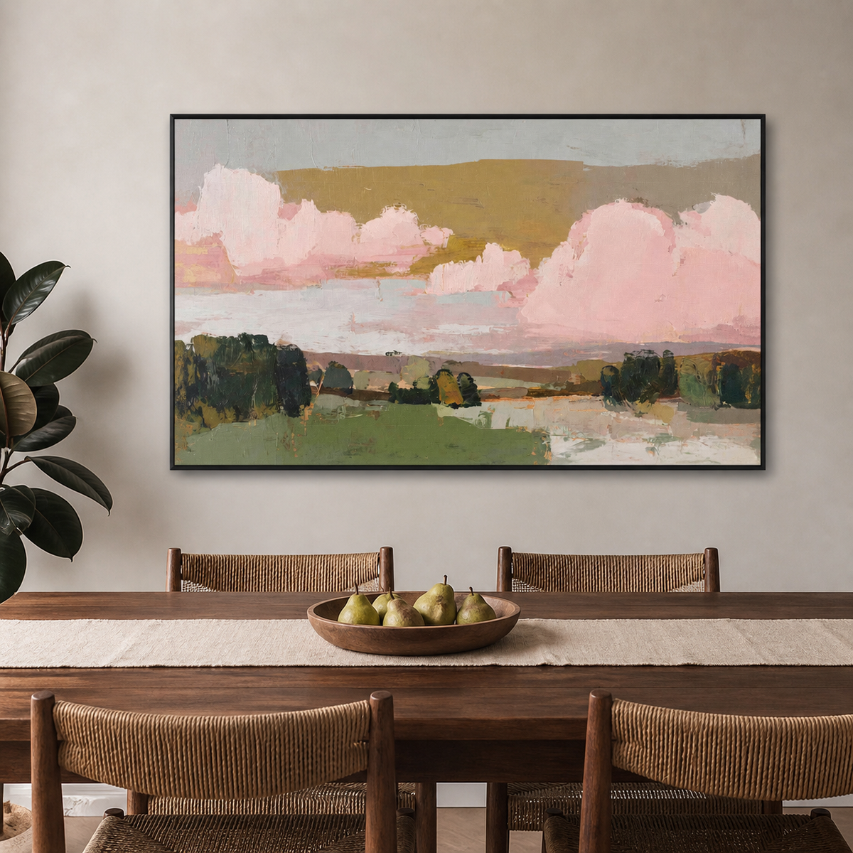 Pink and green abstract landscape wall art with blush clouds and layered fields displayed above a neutral living room sofa.