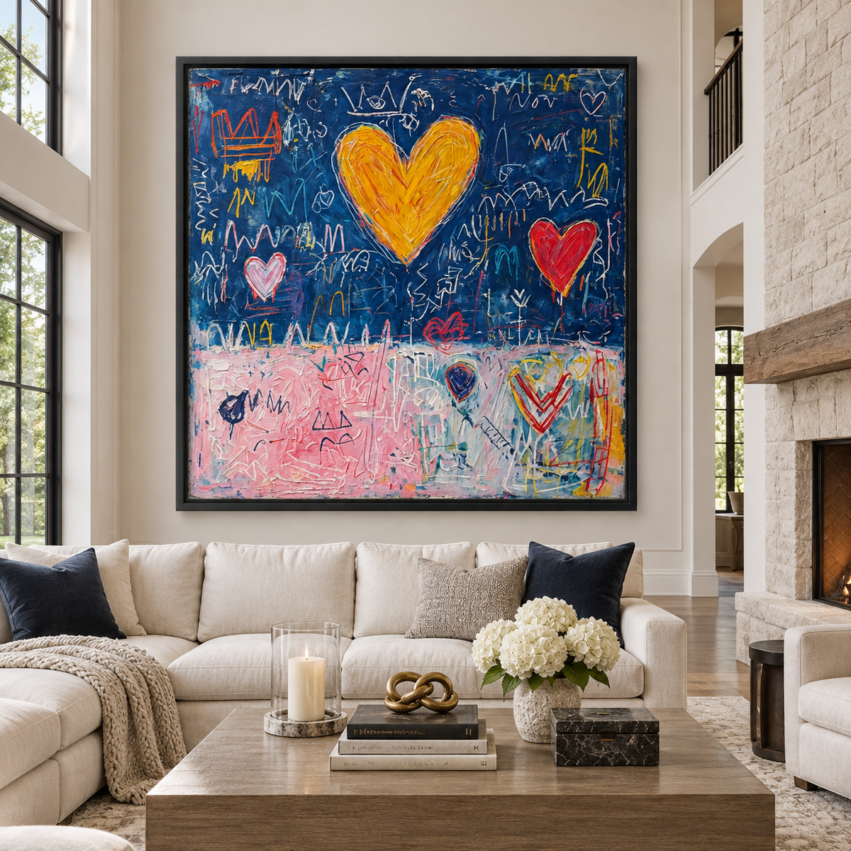 Large square graffiti wall art with golden-orange and red hearts, expressive white marks, navy blue and pink color fields above a cream sofa