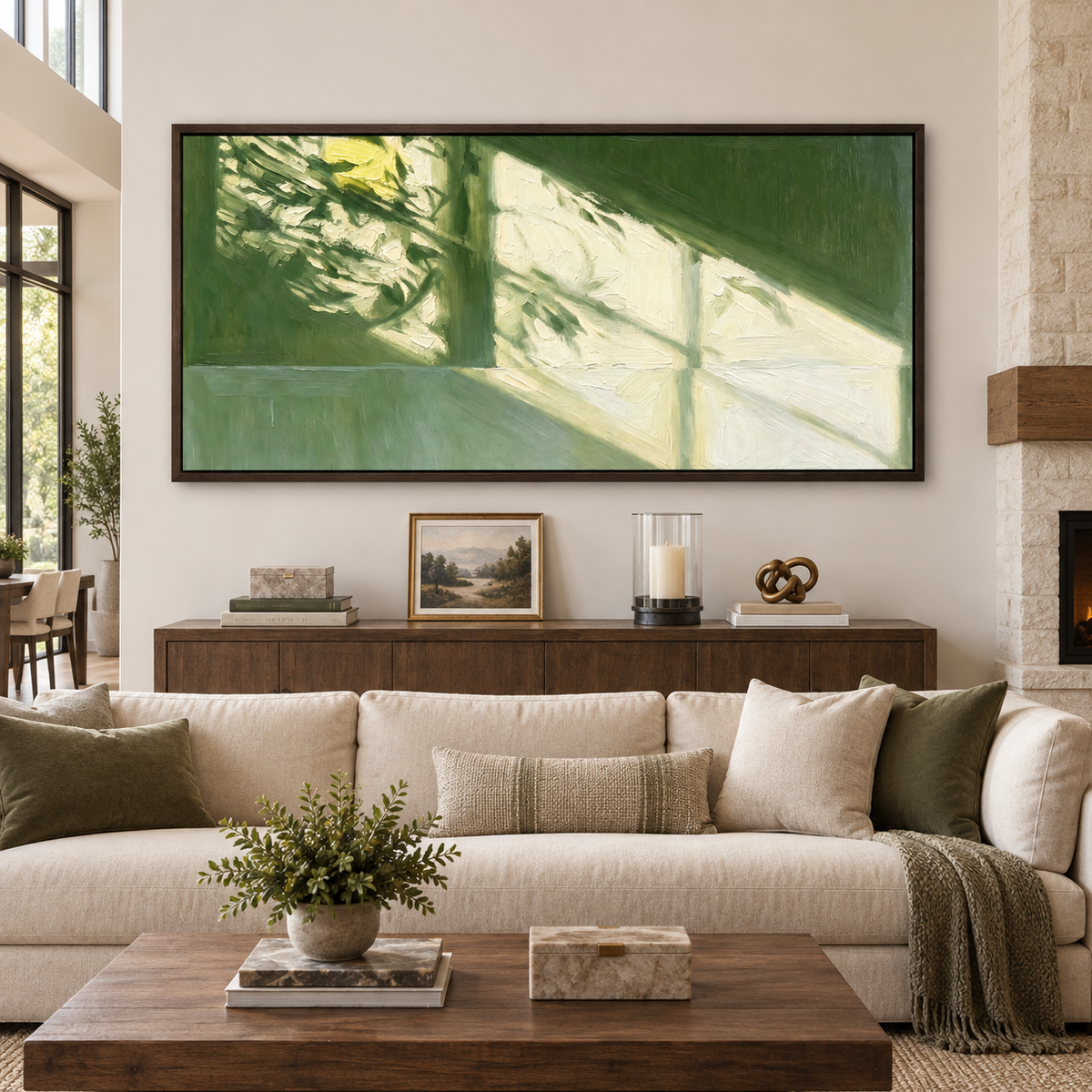 Extra-wide green abstract wall art with cream sunlight and geometric window shadows above a large neutral sectional sofa