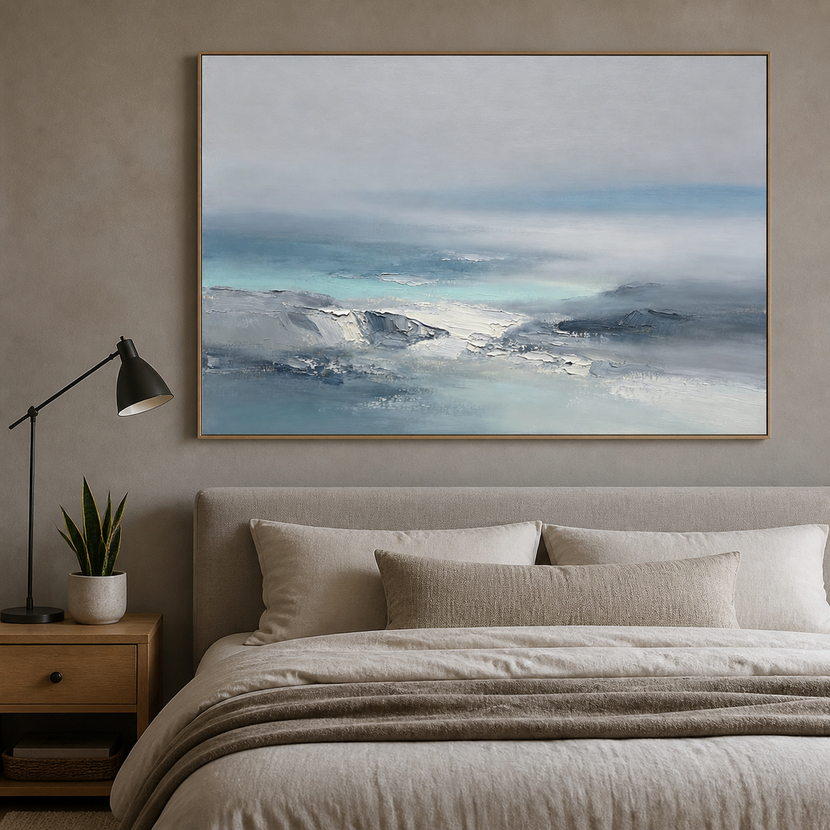 Blue-gray abstract seascape wall art featuring textured ocean waves fading into a soft misty horizon.