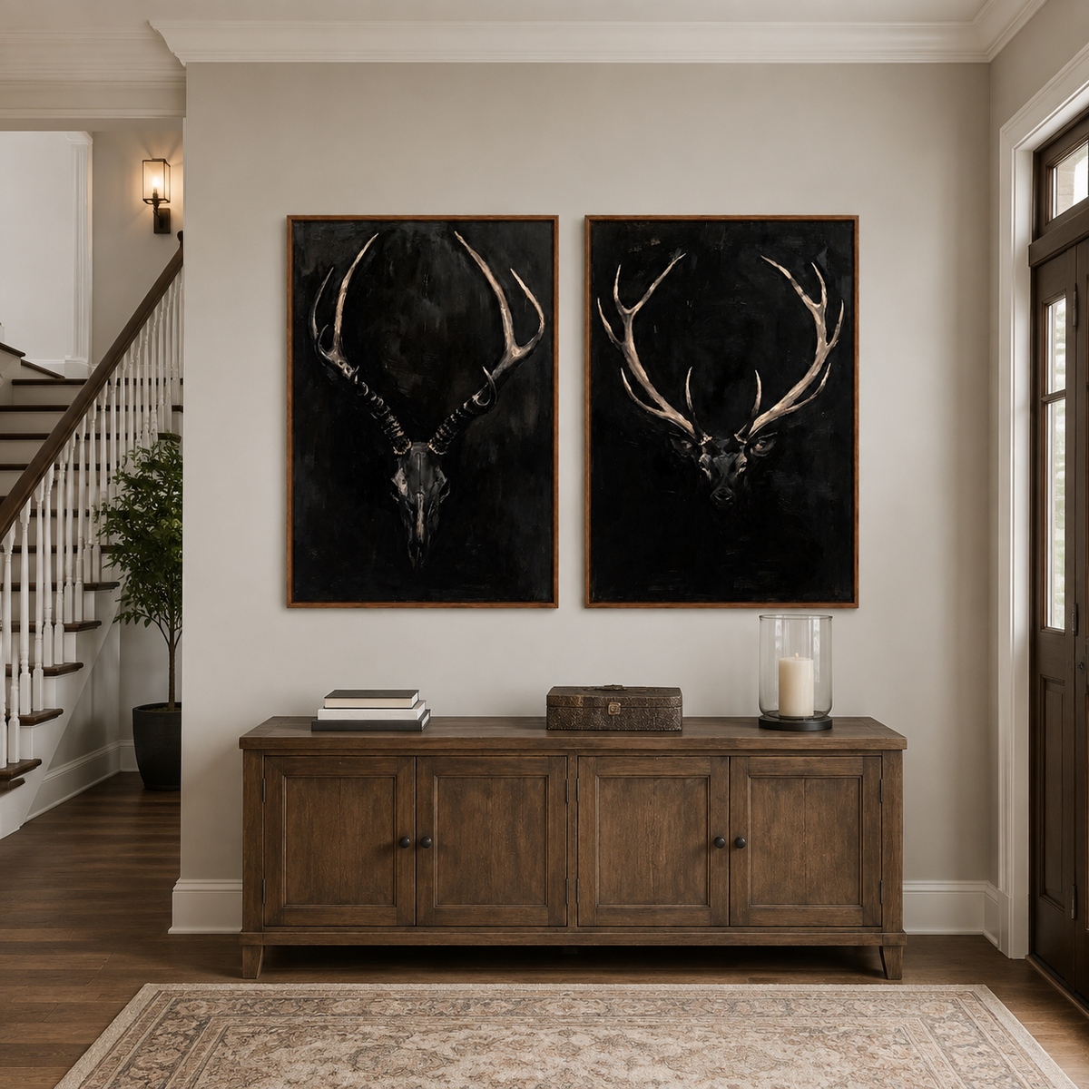 An antlered skull and a stag head against black backgrounds, in an entryway.