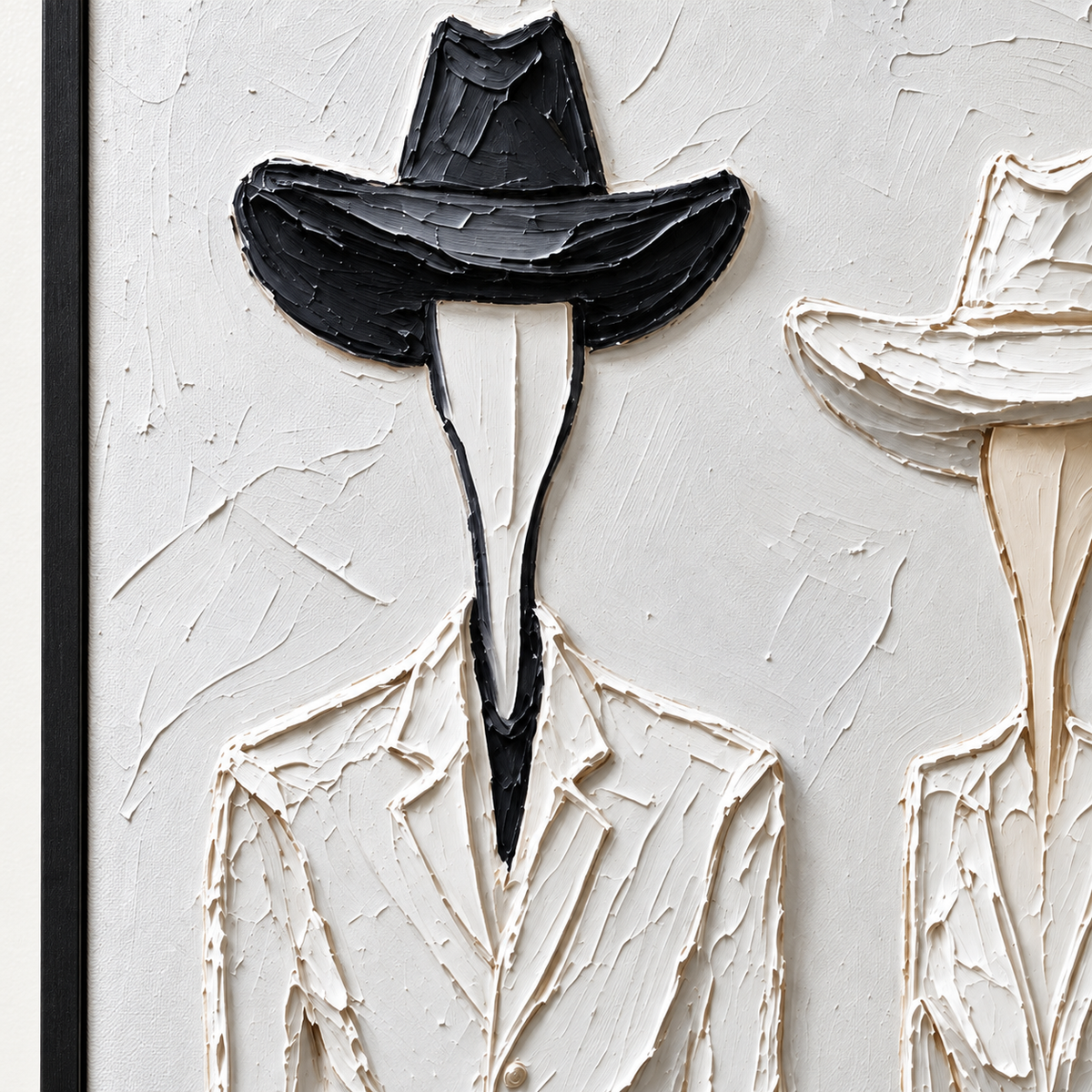 Two slender faceless Western figures in pale clothing, one with a black hat and one with a white hat, close-up of the painted details.