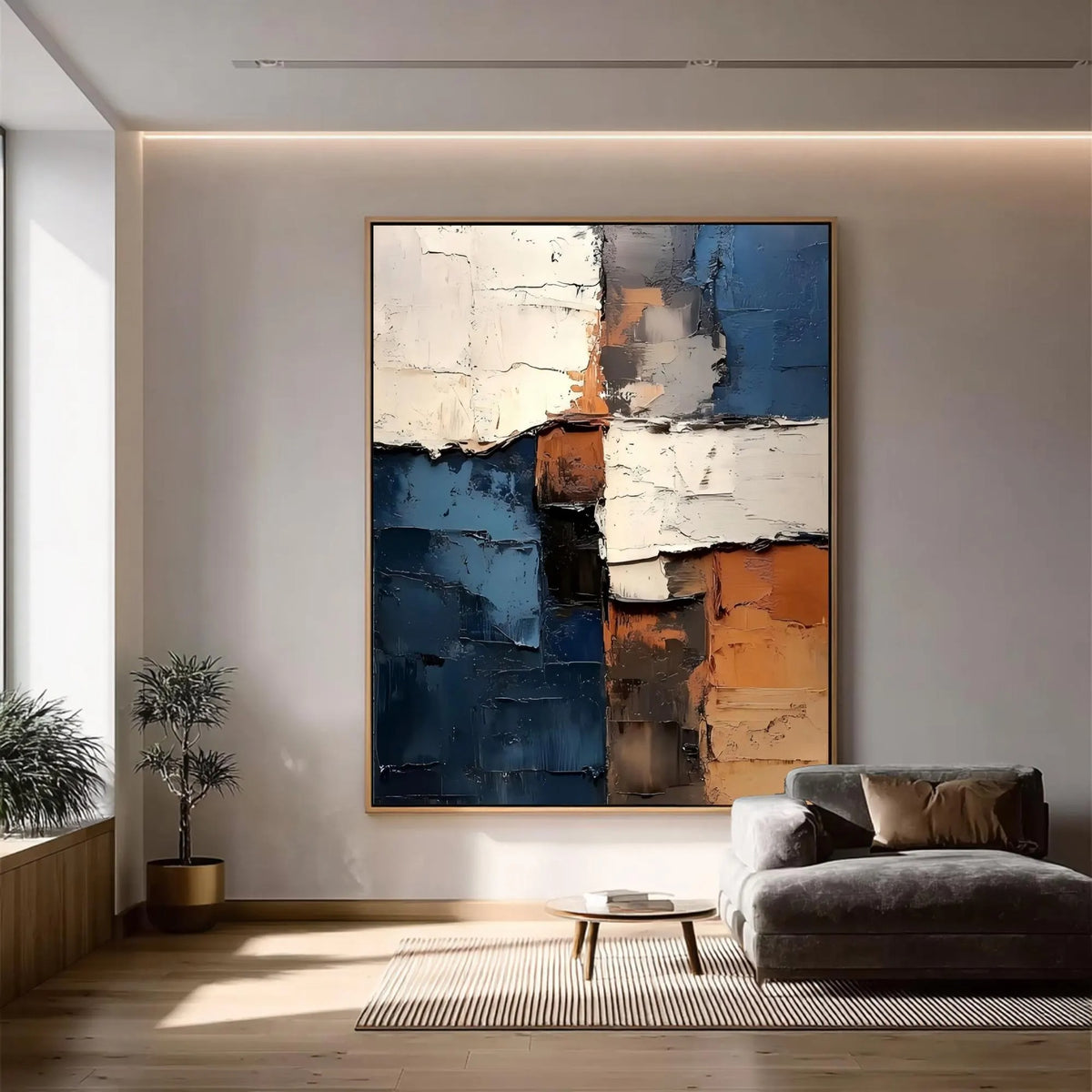 Rough-edged blocks of deep blue, ivory and rust orange in a vertical abstract composition, shown in room setting 5.
