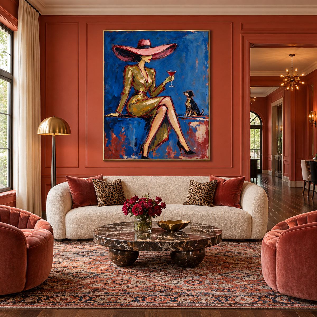 A seated woman in an oversized pink hat holding a red cocktail beside a small dark dog against a rich blue background, shown in a hollywood style home bar.