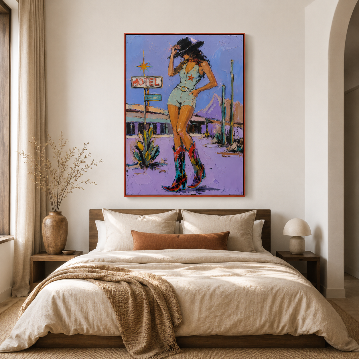 Hand-painted modern cowgirl wall art featuring a stylish woman in colorful cowboy boots standing beside a vintage motel sign in a Southwestern desert landscape