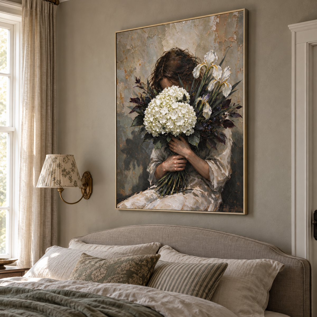 A seated woman embracing white hydrangeas and dark foliage that partly hide her face against a muted gray background, shown from an angle.