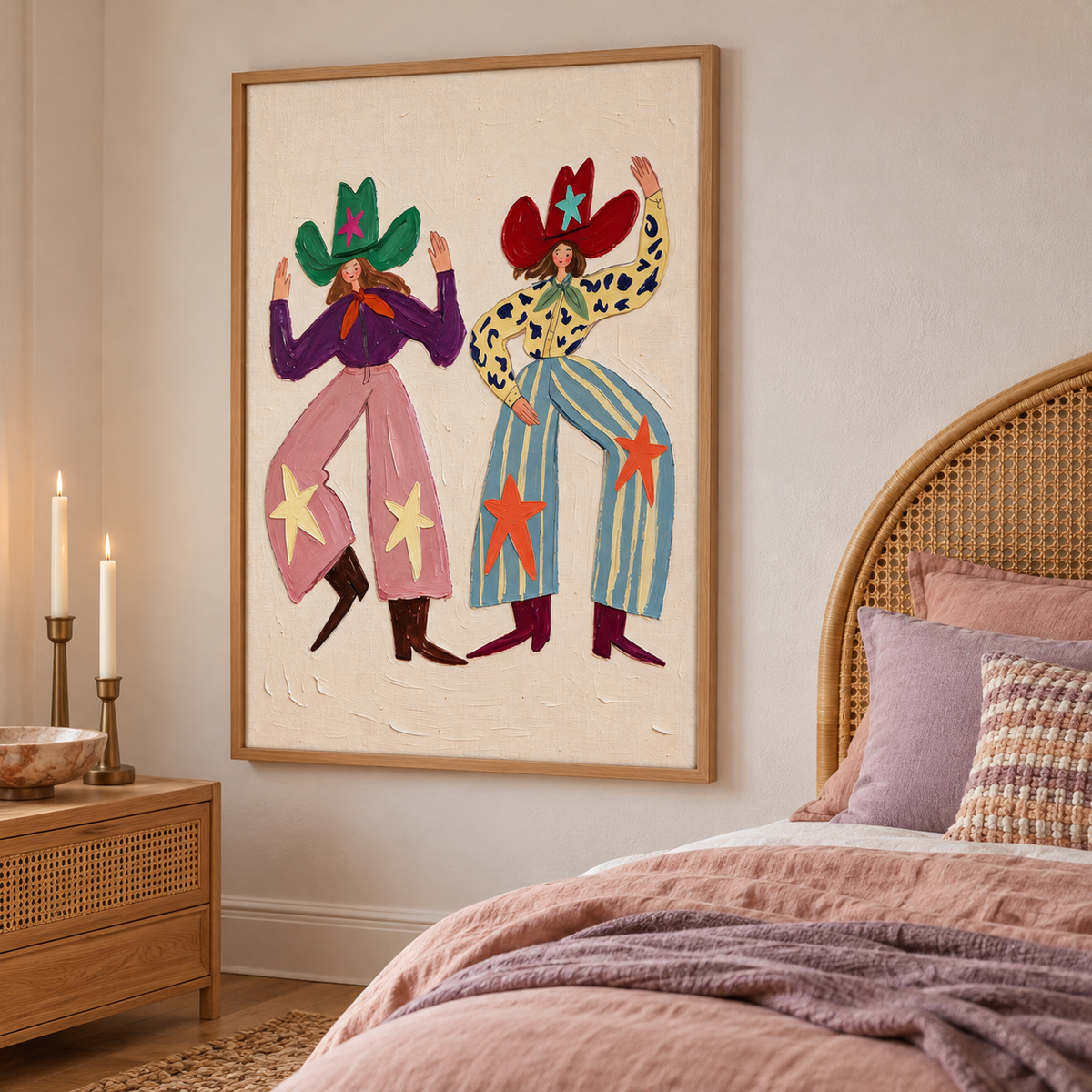 Two smiling cowgirls dancing with raised arms in oversized green and red star-decorated hats, pink and blue patterned pants and pointed boots on a cream background, shown in room setting 4.