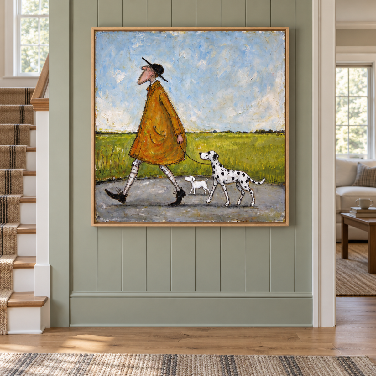 A long-nosed man in an ochre coat and black hat walking a Dalmatian and a small white dog beside a green field under a pale blue sky, shown in room setting 2.