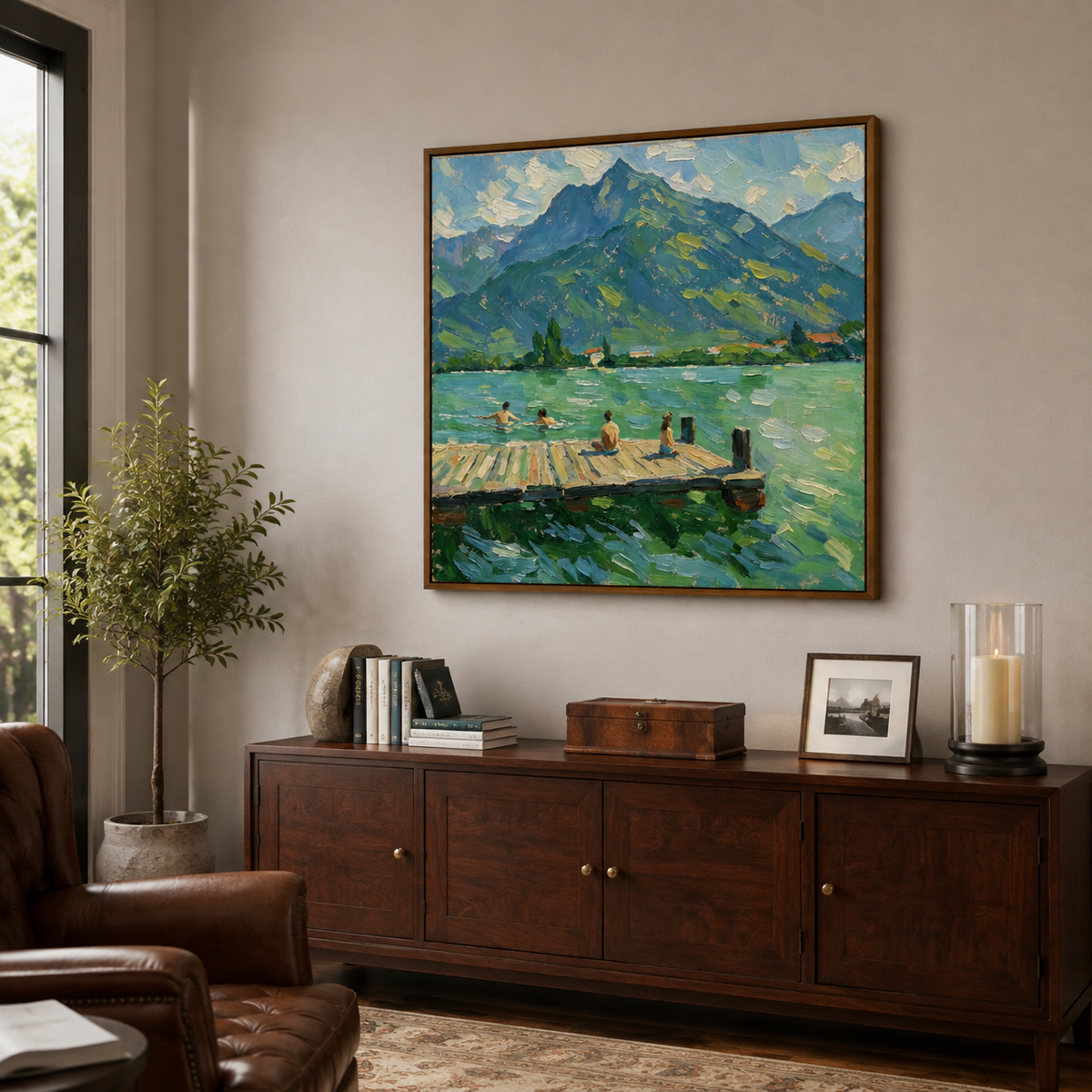 Blue-green mountain lake oil painting in a study beside a leather chair.