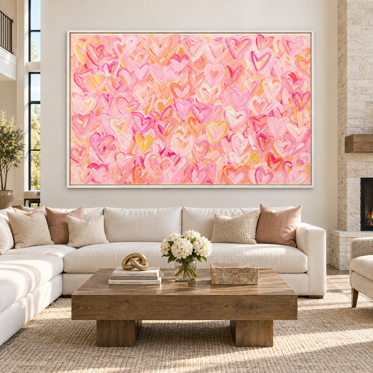 Pink, peach, and yellow hearts layered across a warm pink background, in a large living room.