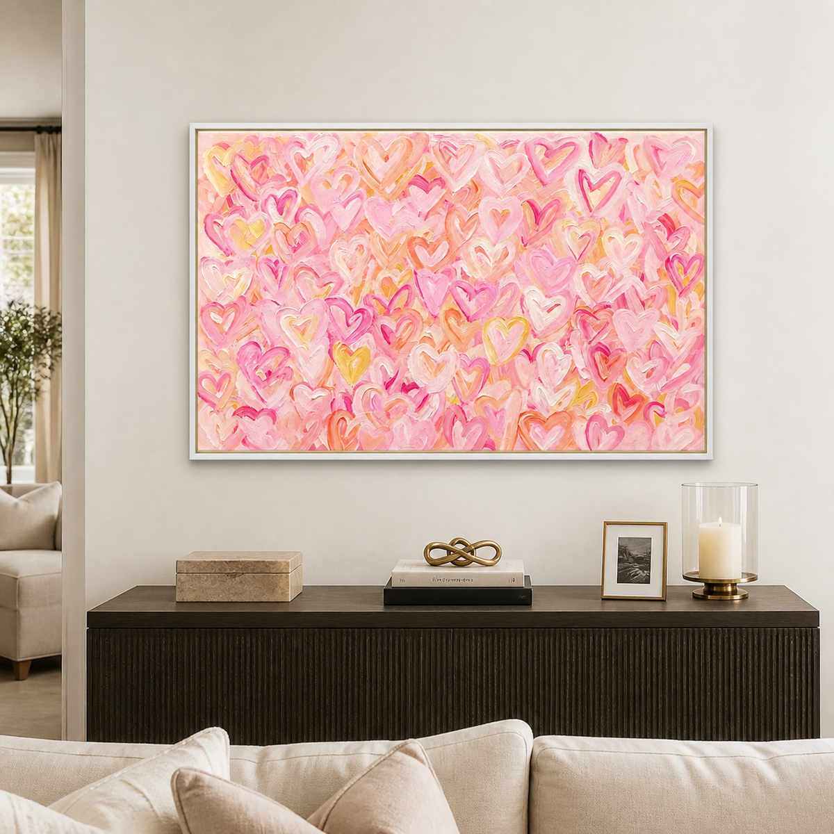 Pink, peach, and yellow hearts layered across a warm pink background, in a living room.