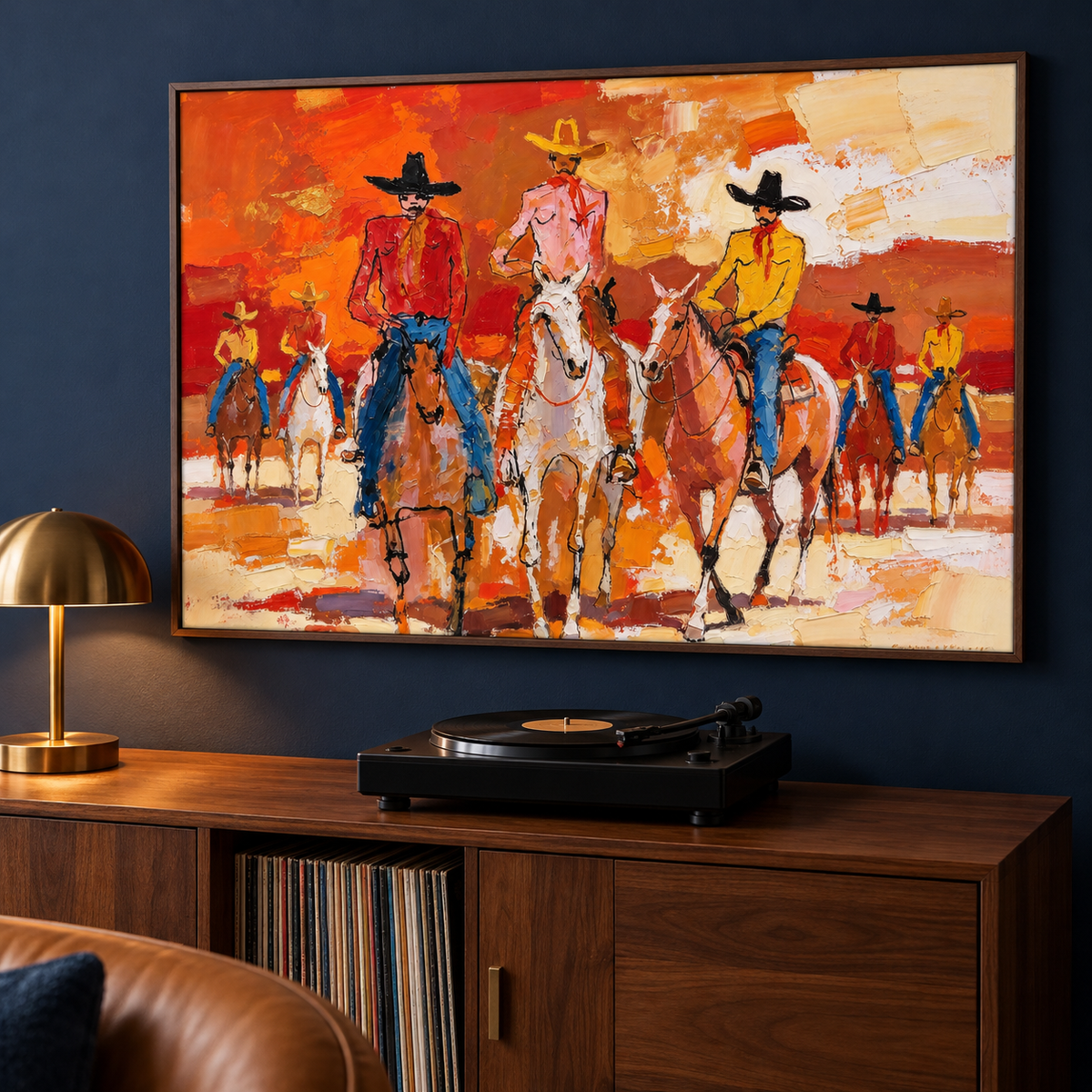 A lively group of cowboys ride across a bright orange-red field, with loose blocks of cream, yellow, blue, and brown shaping the horses and riders., shown from an angle in a record-listening area.