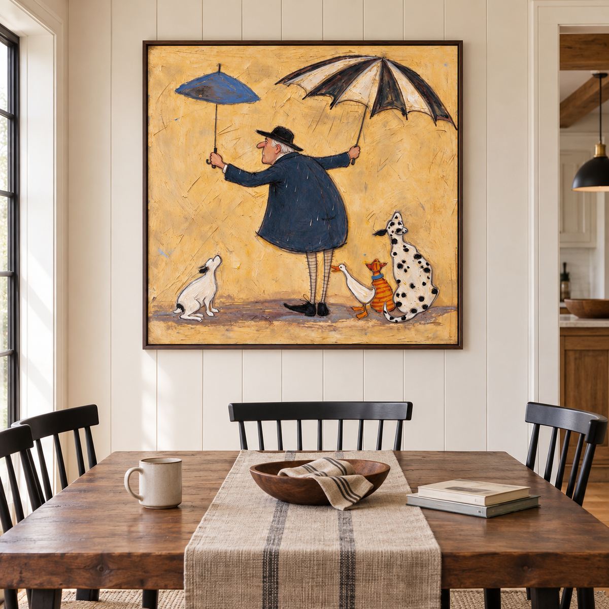 A man in a navy coat holding a small blue umbrella and a large black-and-white umbrella with two dogs, an orange tabby and a white duck gathered around his feet, shown in room setting 2.