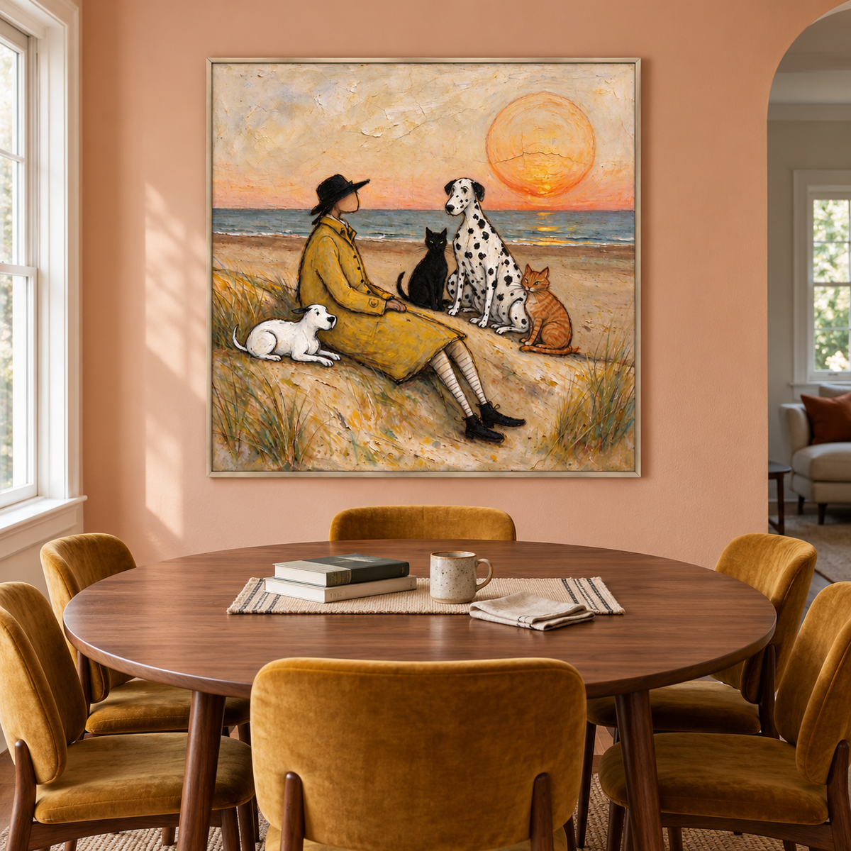 A man in a yellow coat sitting on a sandy beach with a small white dog, a Dalmatian, a black cat and an orange cat beneath a large orange setting sun, shown in room setting 3.