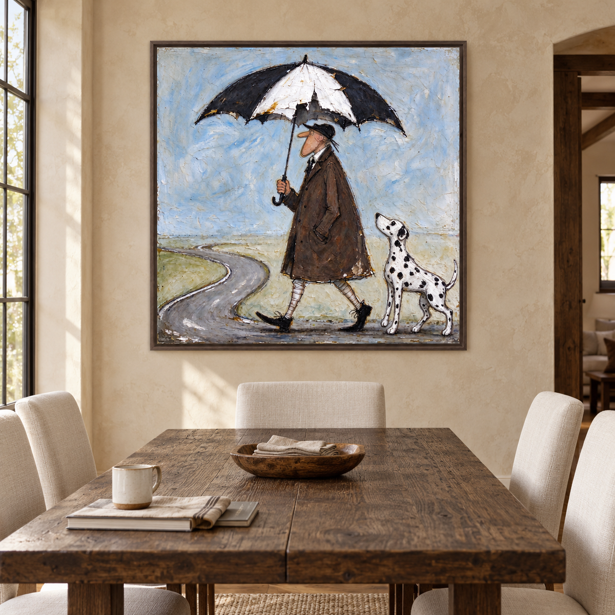 A man in a brown coat walking beneath a large black-and-white umbrella with a Dalmatian looking up at him beside a winding gray road under a pale blue sky, shown in room setting 3.