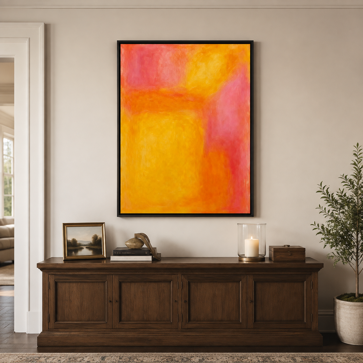 Orange and golden yellow abstract color fields with soft coral pink edges, in a living room.